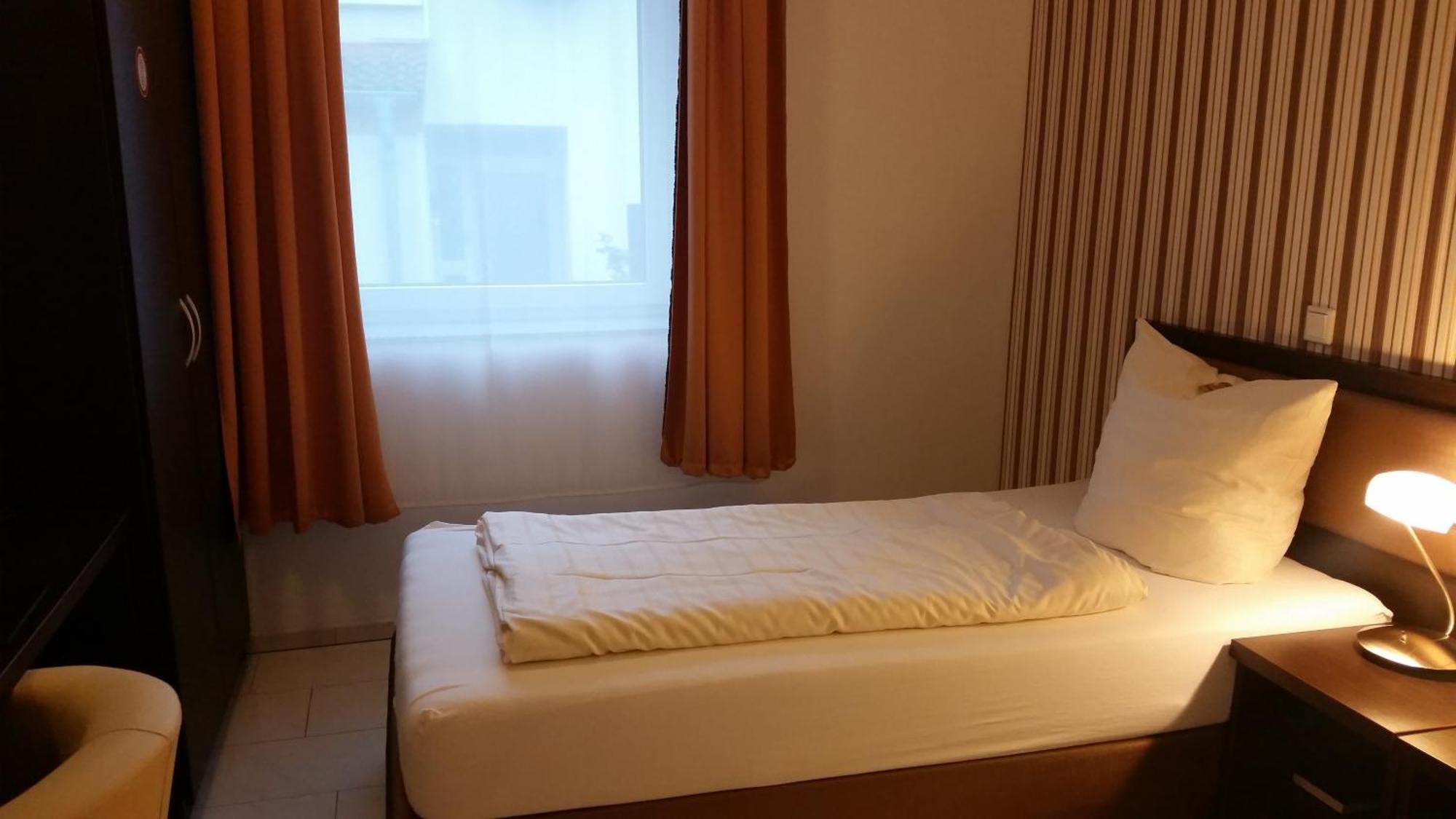 Cityhotel Ahlen Garni Zimmer foto