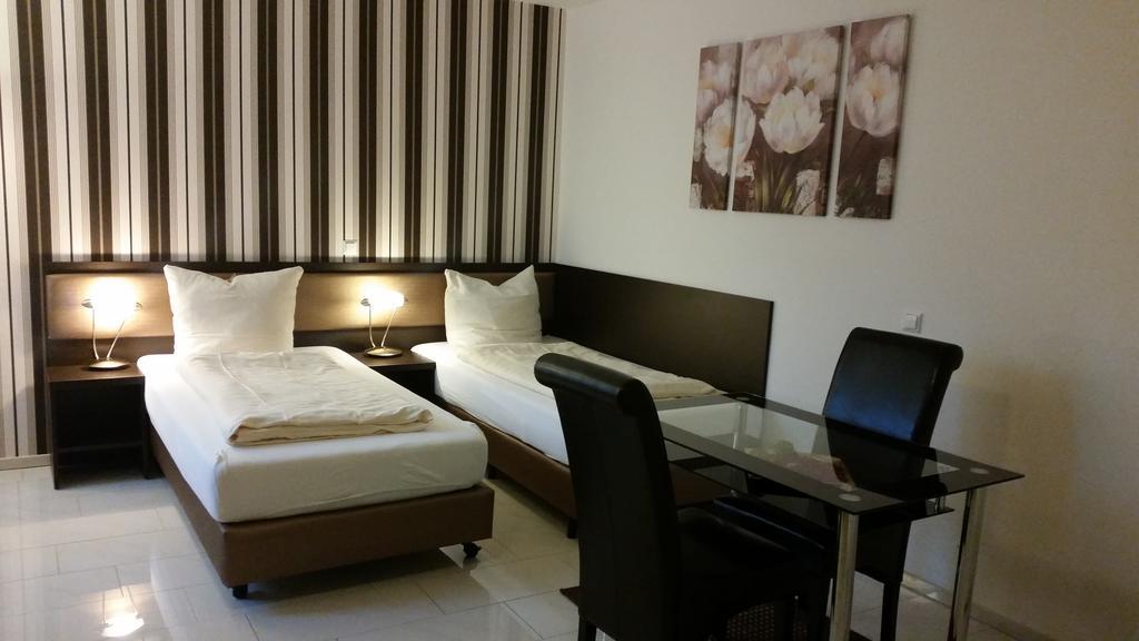 Cityhotel Ahlen Garni Zimmer foto